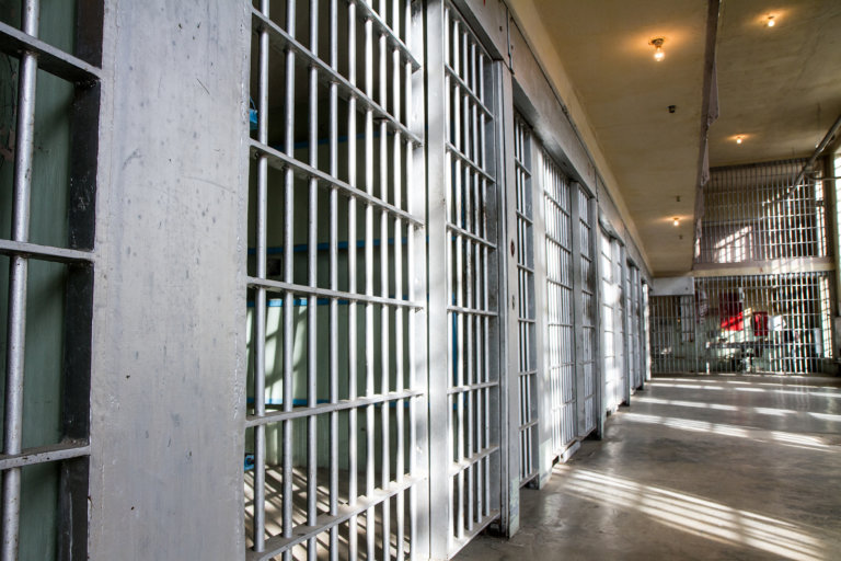 Line of jail cells, representing cook county jail.