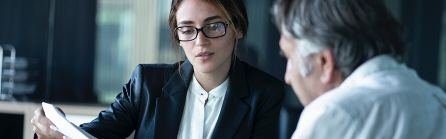 Chicago medical malpractice lawyer discussing with client about their claim.